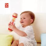 ⁦מקל גשם אדום - Hape⁩ – תמונה ⁦5⁩